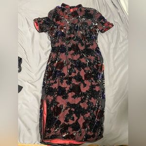 Vintage mandarin collar evening gown with floral embroidery.